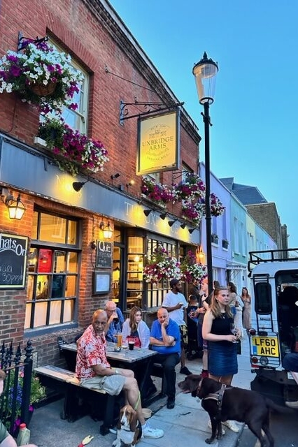 people having fun outside the pub