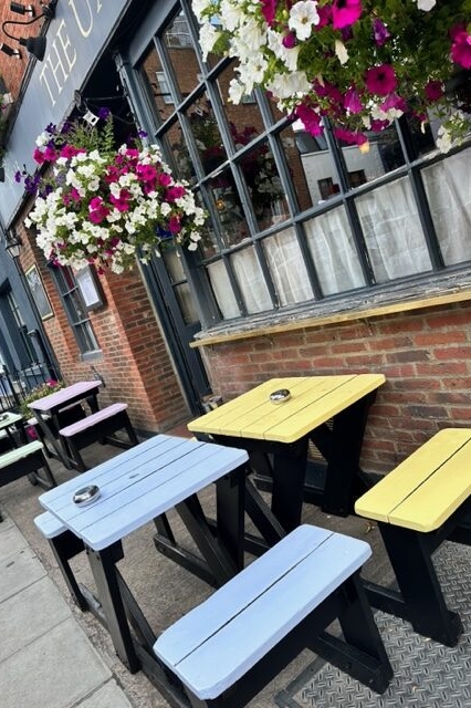 Picnic tables outside the pub